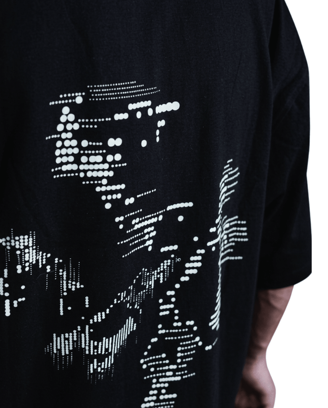Close-up of linear graphic print detail on black 240 GSM cotton t-shirt - VYVHR